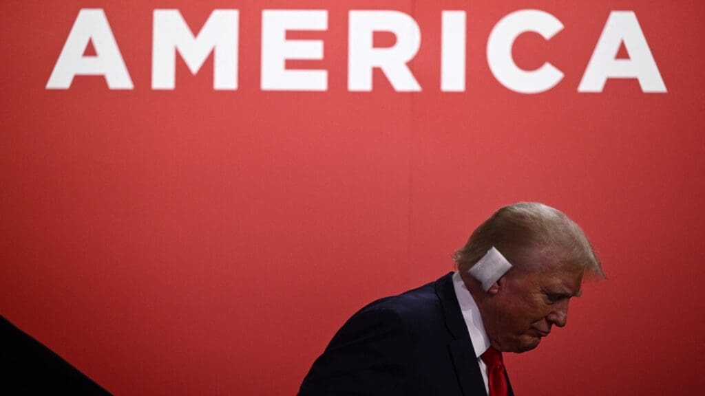 Donald Trump seen with a bandage on his ear after being wounded in an assassination attempt during the first day of the 2024 Republican National Convention at the Fiserv Forum in Milwaukee, Wisconsin, on 15 July 2024.