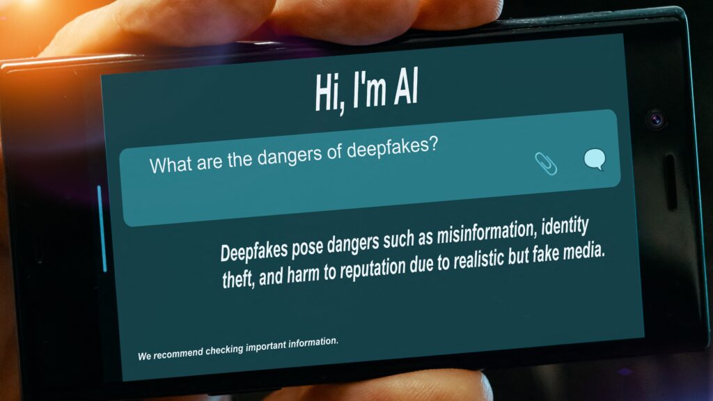 Question for AI on tablet screen. What are the dangers of deepfakes?