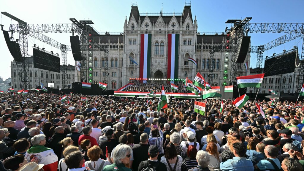 Hungarian Prime Minister Viktor Orban addresses his speech in front of the Parliament building during a campaign rally organised by Hungary's ruling Fidesz party in Budapest, Hungary on March 15, 2026, on the 178th anniversary of the Hungarian Revolution and War of Independence of 1848-1849. The 1848-1849 revolution in the Kingdom of Hungary grew into a war for independence from the Austrian Empire, ruled by the Habsburg dynasty. (Photo by Attila KISBENEDEK / AFP)
