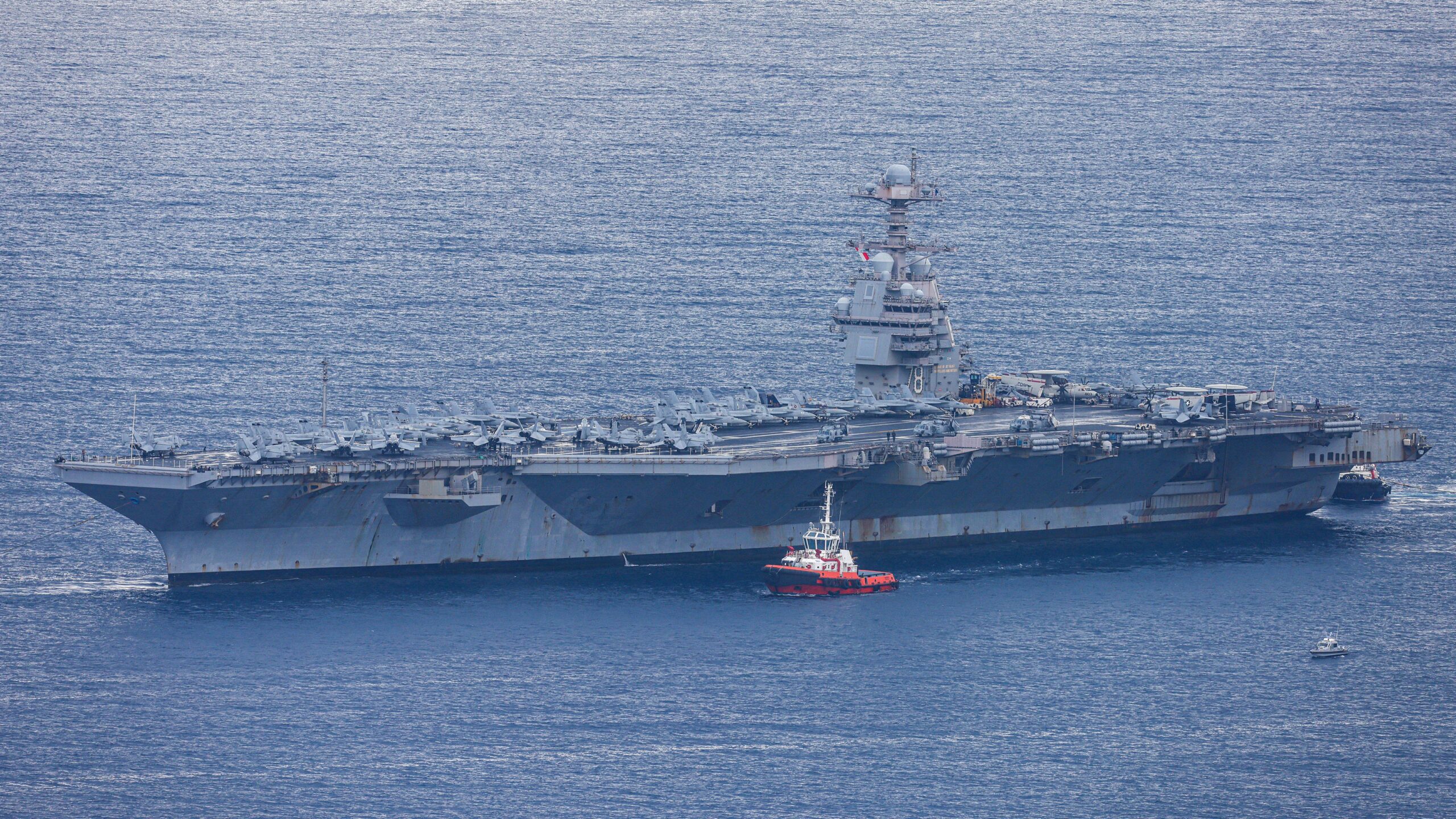The world's largest aircraft carrier USS Gerald R. Ford arrives at Souda Bay naval base after having been part of Middle East war operations, on the island of Crete on March 23, 2026.