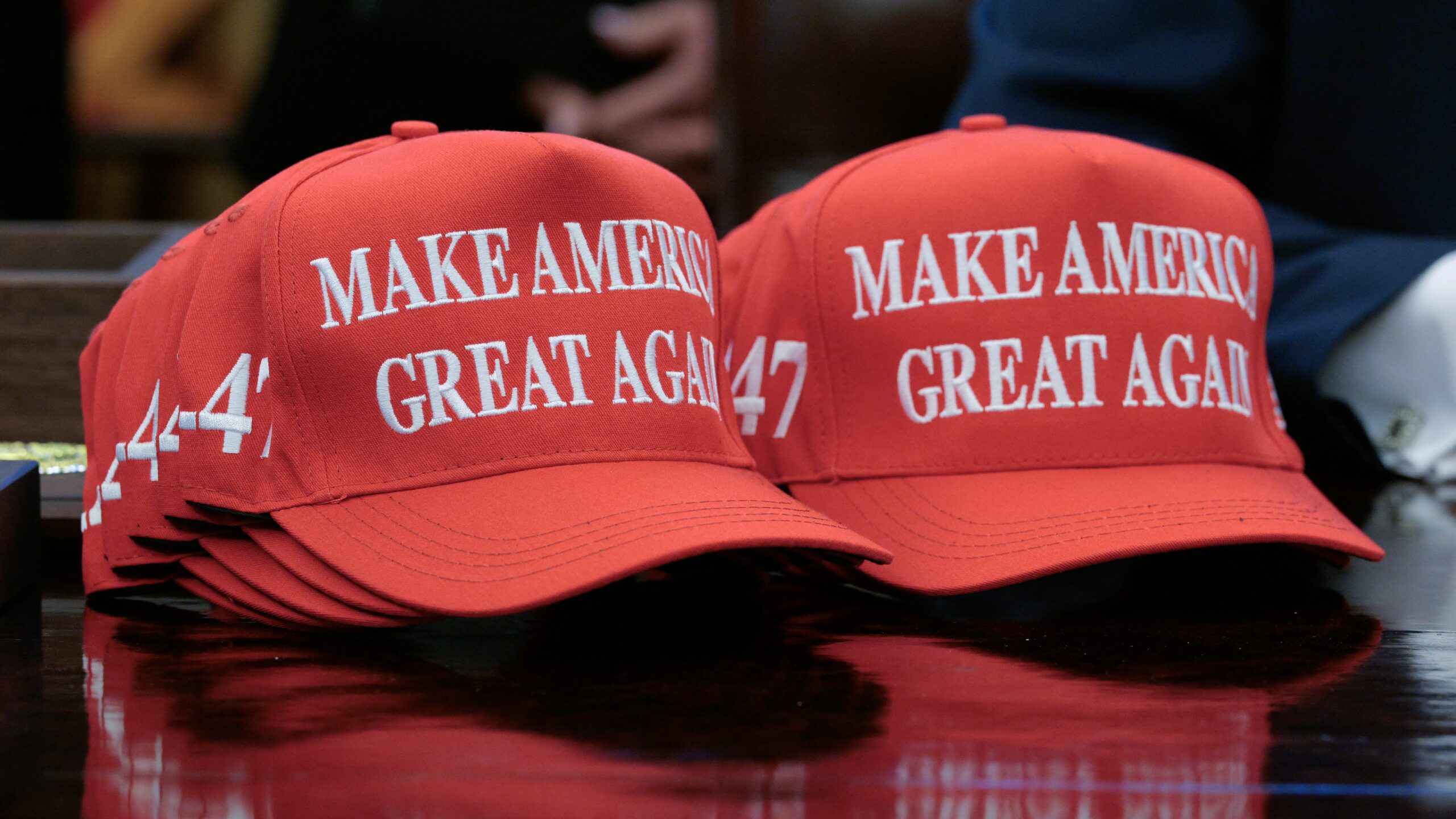 A stack of "Make America Great Again" hats